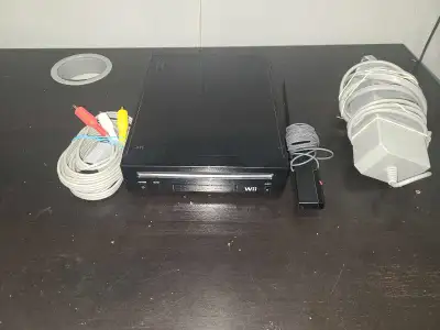 Wii console (not backwards compatible) with cables. No remotes, View more