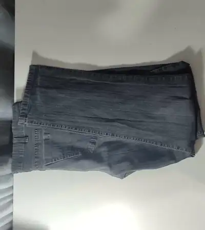 Jean gris pour garçon. Taille 38. Jamais porté. Vendu car la taille ne convient pas