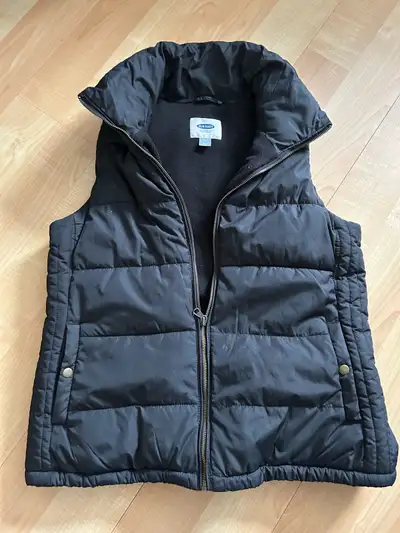 Ladies Old Navy black fleece lined vest $30, Medium, gently used Wind River puffer vest XL $35, full...