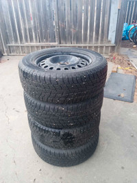 Motomaster Winter Edge 235/60R17 w/ steel rims (4 tires)