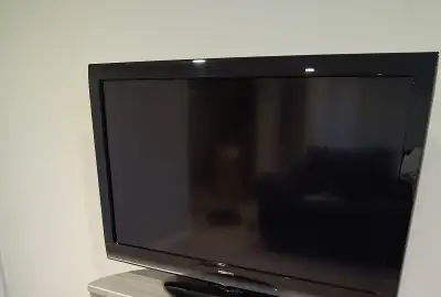Toshiba 46" TV with remote, View more