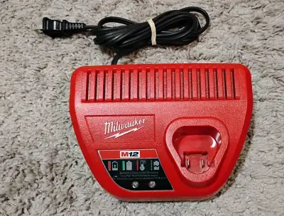 MILWAUKEE M12 BATTERY CHARGER NEW., View more