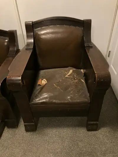 His and hers antique arm chairs. Hers chair is a rocker. Needs to be restored. Wood is cherry.