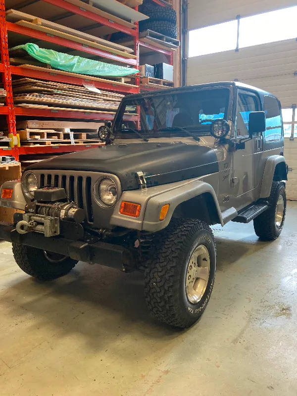 2001 Jeep TJ, 4L 5speed. 2 sets of tires and rims.