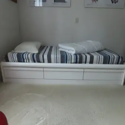 Twin sized white mates bed, View more