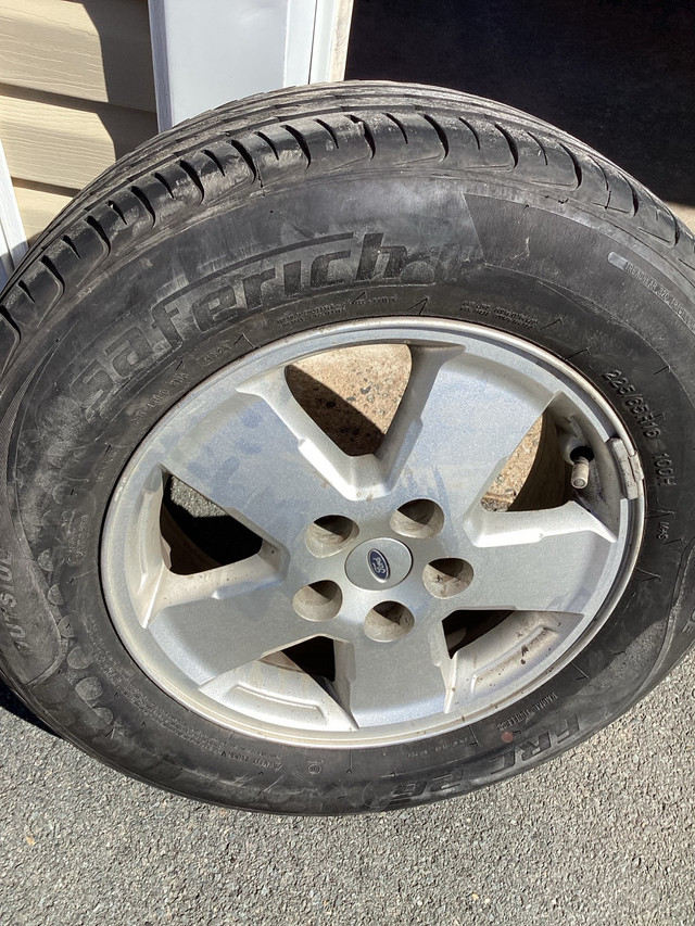 For sale: Four 225 65 16 all season tires on Escape rims in Tires & Rims in Annapolis Valley - Image 3