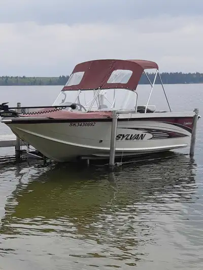 2011 Sylvan Expedition 1700 with Evinrude 115 2 stroke motor. This fishing boat is also equipped wit...