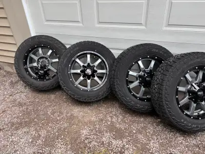 Set if 4 Moto Metal rims, caps and Falcon tires. Rims are in excellent condition, no rash or damage....