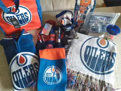Show off your Oilers pride with this ultimate #1 Oilers Fan Package! This collection includes a vari...