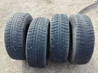 Set of 4 Michelin X-Ice Winter Tires Studless 215/70 R15 Made in Japan 150$ Please CALL 403 333 6626...