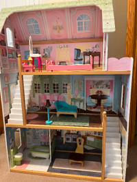 Doll house, great condition, includes furniture $100