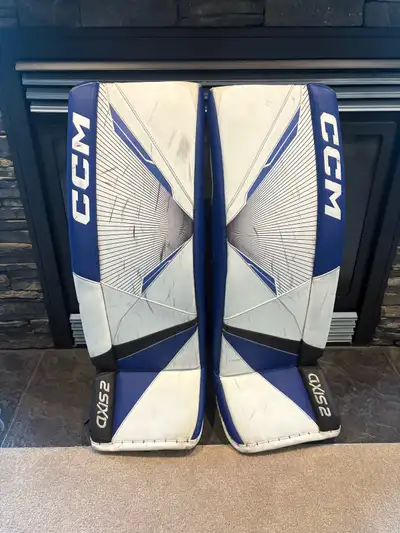 CCM Axis 2 Intermediate Goalie Pads Size 32+2 All straps and buckles are intact and working No smoki...