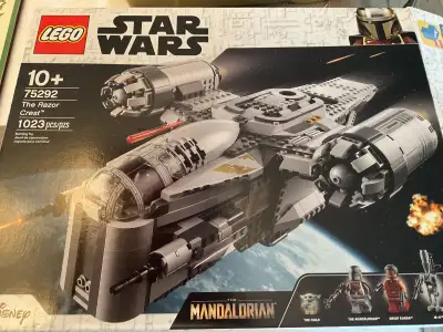 This is built. The set is complete with all of the mini figures including baby yoda. Box and instruc...