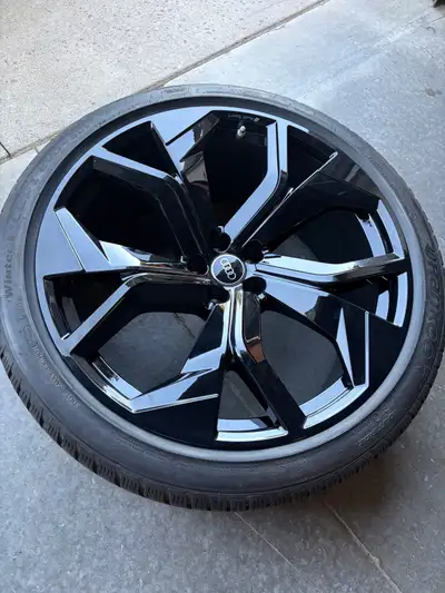 Complete set of four genuine OEM Audi Sport 23-inch black winter wheels and tires. The set was purch...