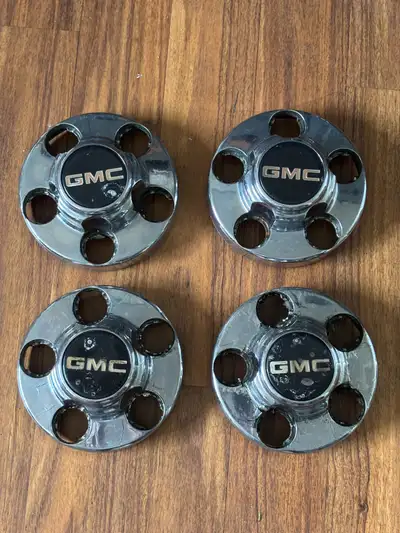 SET Of 4 GMC Chrome Hub Caps. Fair Condition. No Cracks. The Chrome on one of the Caps is Starting t...