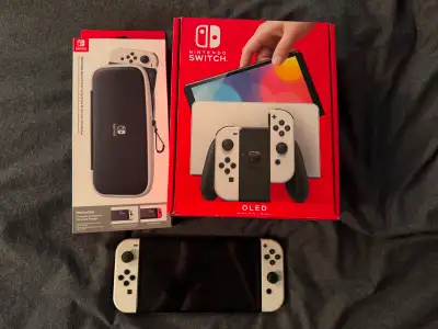 Je vend ma Nintendo Switch OLED qui vient avec le dock, la boîte d'origine, les câbles, manuels et j...