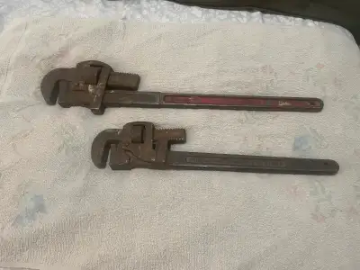 2 older pipe wrenches, View more
