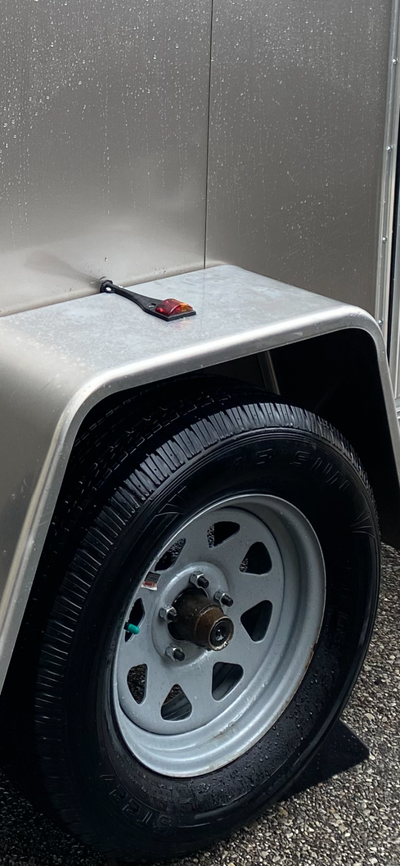 Trailer tires & rims ST 205/75/15” used 500 km Set $100.00 Upgraded to aluminum rims priced to sell
