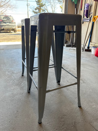 2 grey steel Structube stools 