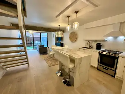 900 square feet of living space over two floors. Luxury finishes throughout including porcelain coun...