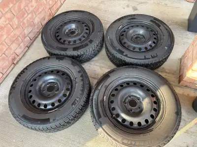 Tires and rims are in good condition 17" black steel wheels DT 752003 Michelin X-Ice Snow 225/65R17/...