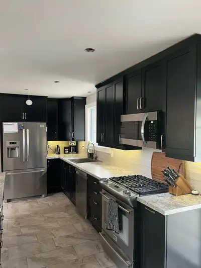 10 year old cabinets by Phoenix kitchens. Have some wear. Not shown, 2 more upper cabinets the size...