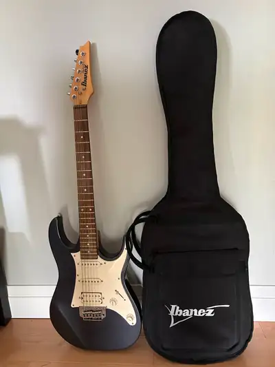 Ibanez guitar and case, View more