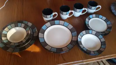 16 pc dishes set - NEW but with some chipped dishes - as pictured - damaged in shipping