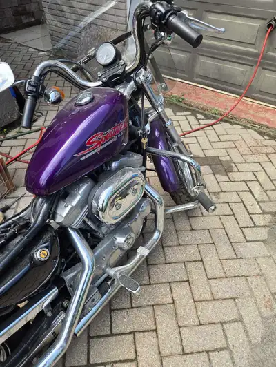 2002 Harley Davidson 883 sportster hugger, about 12000 miles, new front and rear tires, comes with r...
