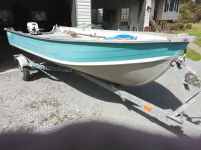 14 foot Aluminum Boat with trailer and 9.9 Johnson outboard motor 2 stroke. Good condition no leaks....