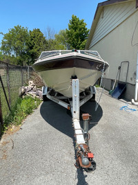 Evinrude 90 VRO V4 motor and 16’ EZ LOADER boat trailer