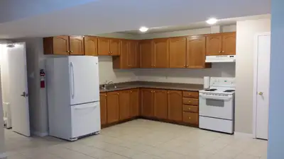 Legalized, clean maintained basement apartment with kitchen/living room, pantry, 3 piece bathroom, 2...