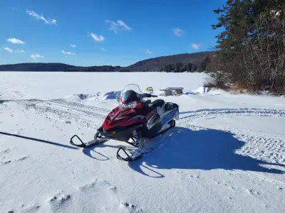 $6,500 cash and ready to go & come with studded track lift cove & heated helmet