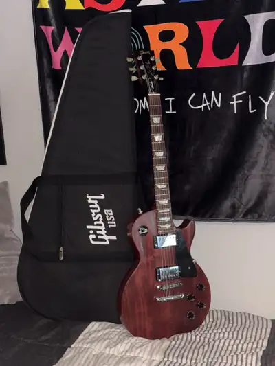 This is an Awesome Guitar!!! i bought this guitar around a month ago and i have have to say it plays...