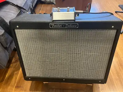Great condition Fender Hot Rod Deluxe. Made in USA, May 1999. Comes with footswitch and stand. Great...