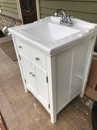 Bain encastré et meuble lavabo