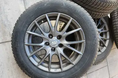 215 60R16 Michelin Winter Tires 5x100 wheels (16x7 & 35mm Offset) Includes TPMS sensors for Chevrole...