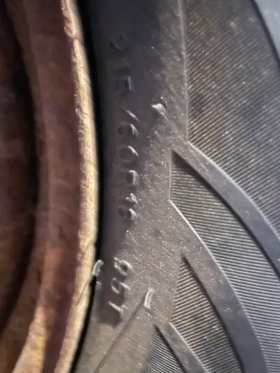 Two good tires with four rims.