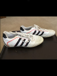 Adidas White Traxion Hard Ground Soccer shoes