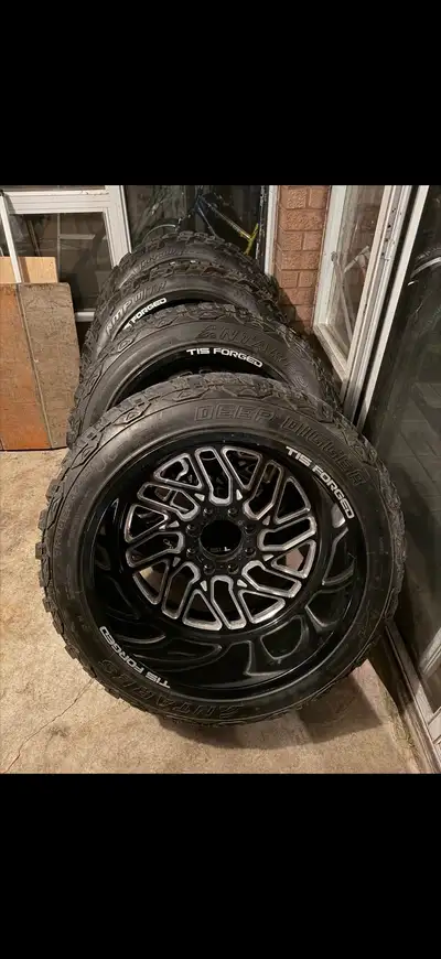 24x14 TIS Forged F51 wheels with 37/ 14.5 r24 tires Wheels are -76 offset No hubcaps but they are av...