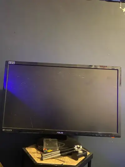 ASUS gaming monitor 1920x1080 LCD 144 hz Has a couple scratches on it but works perfectly fine Price...