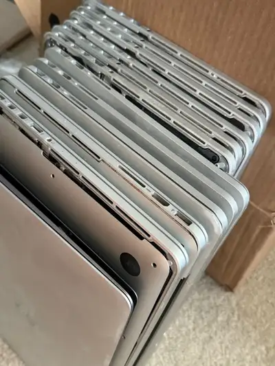 12 top cases with logic boards MacBook Pro models A1502, View more
