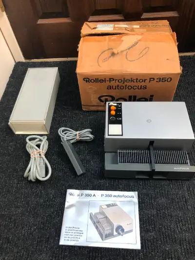 Rollei P350A 35mm Film Slide Projector with Preview Screen & Cord Remote. Comes with the original Ma...