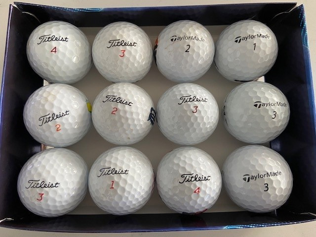 8 Balles Titleist + 4 TaylorMade dans Golf  à Ville de Québec
