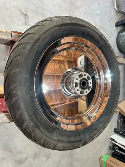 Front tire and solid Harley Davidson rim came off a 2003 road glide. Tire is a Michelin commander 3...