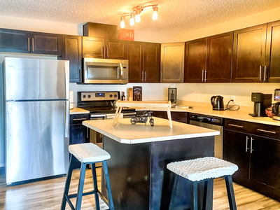 2 MIN WALK TO CLAREVIEW LRT train & bus terminal station located North Edmonton. LRT to U of A, Gran...