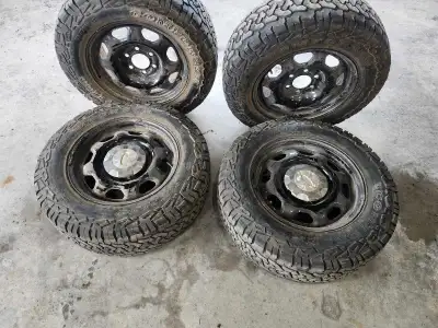 4 Tires and rims off of a 2010 Ford F150 Tires are in good condition with about 1/4 inch of tread. T...