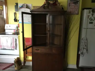 Corner china hutch needs tlc , Some handles are missing phone 895 2372 if interested, no text please...