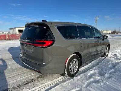 The 2024 Chrysler Pacifica Touring-L in stunning White offers a front-wheel drive experience with ou...