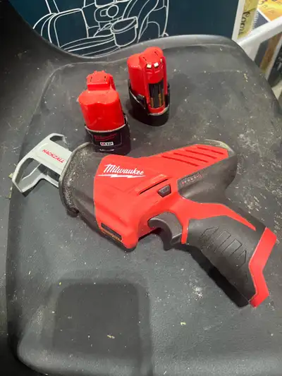 Milwaukee m12 hakzall and two batteries , View more